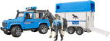 2588 - BRUDER - Land Rover Defender Polizia con rimorchio, cavallo e poliziotto