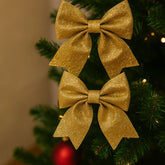 Fiocchi Glitterati Oro in Spugna Set 2 Pezzi Decorativi XNA18021521