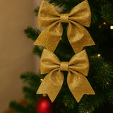 Fiocchi Glitterati Oro in Spugna Set 2 Pezzi Decorativi XNA18021521