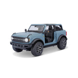 31457 BU Bburago Maisto - Ford Bronco Badlands 2021 (no door), blu