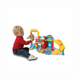 503907 VTech - Vroom Vroom Go: Maxi caserma dei pompieri interattiva