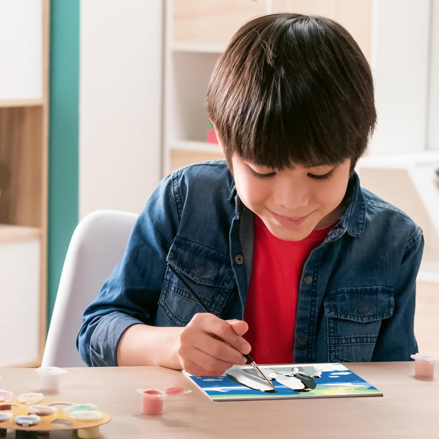 12023058 CreArt Serie D - La famiglia di pinguini - Ravensburger